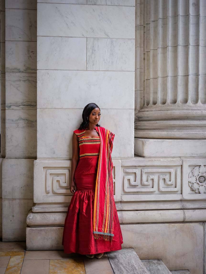 Bride in red traditional African dress