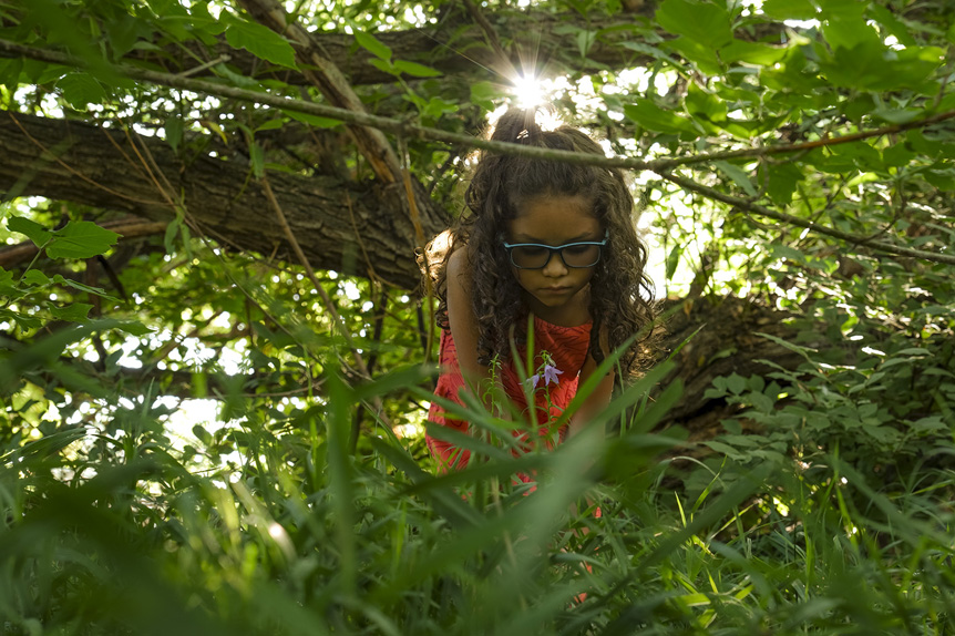 Young African-American girl in woodland