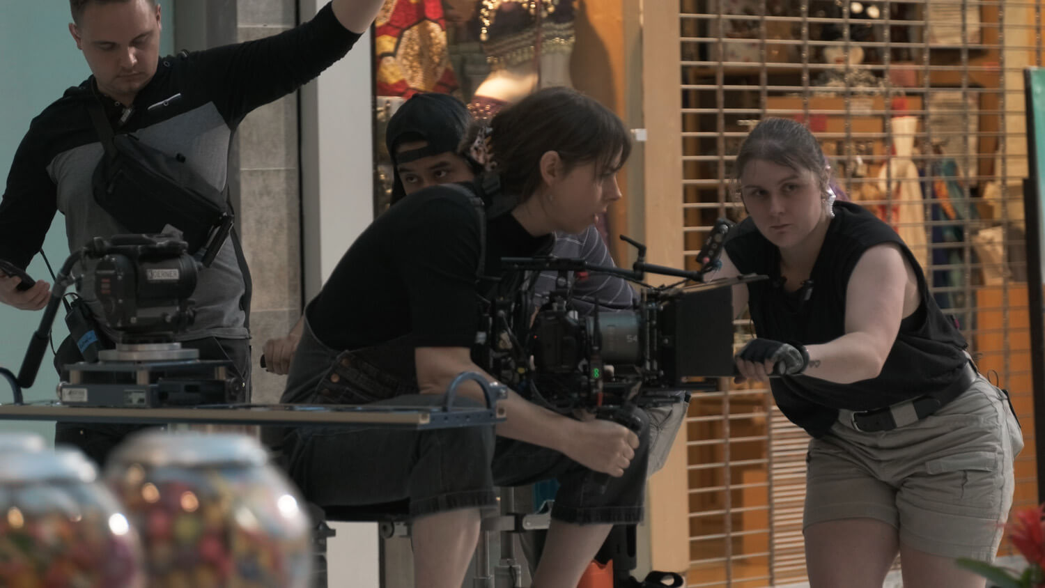 Film crew working to set up a shot on a film set