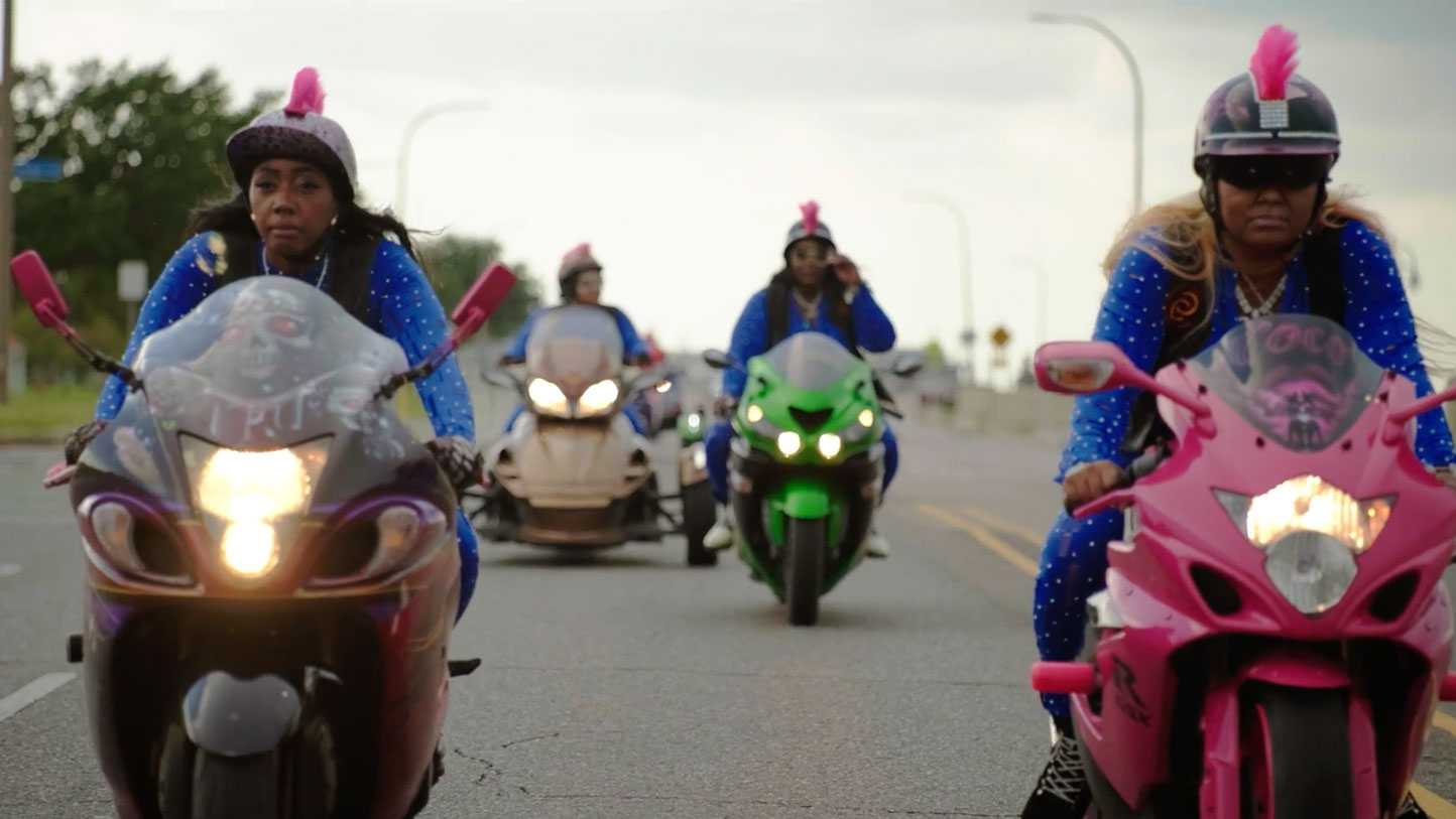 Women riding motorbikes